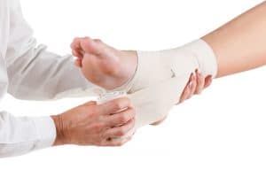 Flexible elastic supportive orthopedic bandage isolated on white background, compression stabilizer ankle.